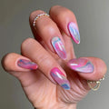 Hand with colorful watercolor nail design on a neutral background, Obroi