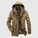 Brown winter jacket with a hood on a light gray background, Obroi