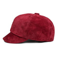 Red suede cap on a white background, Obroi