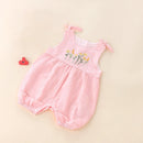 Pink baby romper with floral design on a beige background, Obroi