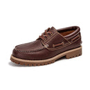 Brown leather boat shoe on a white background, Obroi