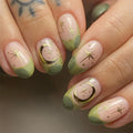 Nails with green and pink design on a neutral background, Obroi