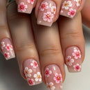 Nails with floral design on a neutral background, Obroi