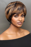Woman with a stylish haircut against a neutral background, Obroi