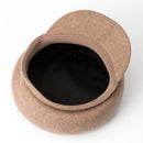 Brown pet bed with black interior on a white background, Obroi
