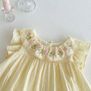 Yellow dress with floral embroidery on a white background, Obroi