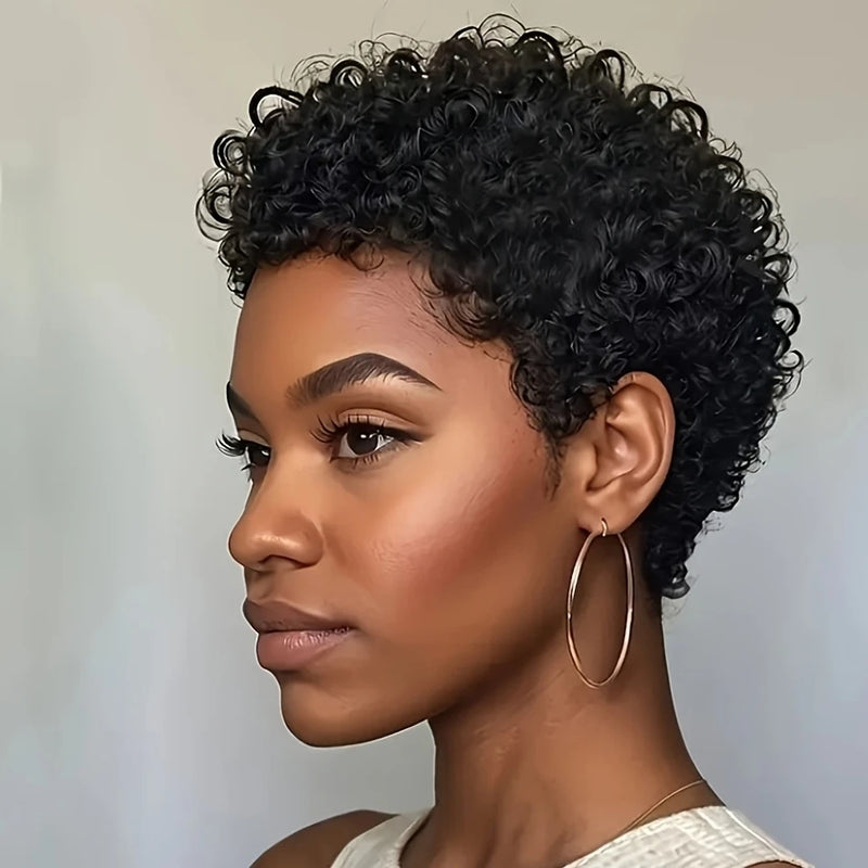 Woman with styled short black hair against a neutral background, Obroi