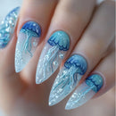 Nails with jellyfish design and blue glitter on a neutral background, Obroi