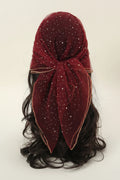 Red glittery headscarf with a bow on a white background, Obroi