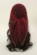 Red glittery headscarf with a bow on a white background, Obroi