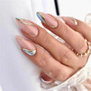 Hand with light blue and gold nail design on a white background, Obroi