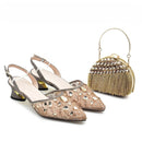 Pair of embellished shoes with a matching handbag on a white background, Obroi