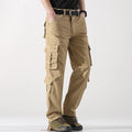 Person wearing beige cargo pants on a white background, Obroi