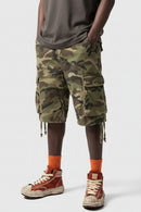Camouflage cargo shorts with a person wearing them on a white background, Obroi