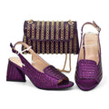 Purple high-heeled shoes and matching handbag with gold accents on a white background, Obroi