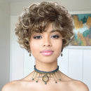 Woman with styled hair and a necklace in a neutral setting, Obroi