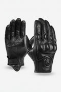 Pair of black leather gloves on a white background, Obroi