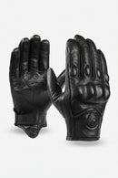 Pair of black leather gloves on a white background, Obroi