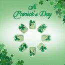 St. Patrick's Day nail art design with green shamrock decorations on a green background, Obroi