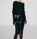 Person wearing a black off-shoulder top and glossy black skirt on a white background ,Obroi