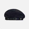 Black denim cap with a belt and buckle on a white background, featuring 'Obroi' branding.