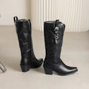 Pair of black knee-high boots with buckles on a light background, Obroi