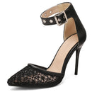 Black high-heeled shoe with lace detail and studded ankle strap on a white background, Obroi