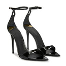 Black high-heeled shoes with ankle straps on a white background, Obroi