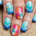 Nails with ocean-themed design on a sandy background, Obroi