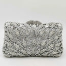 Silver beaded clutch bag on a white background, Obroi