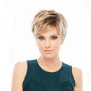 Woman with a stylish haircut wearing a green dress on a white background, Obroi