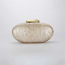 Oval-shaped clutch with a gold top on a light gray background, Obroi