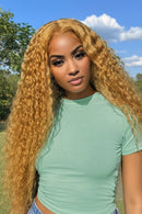 Woman with long blonde curly hair and close-up of the hairline and lace front, Obroi