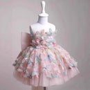Pink floral dress on a mannequin against a gray background, Obroi