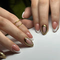 Close-up of hands with pink and white nail polish and gold nail art on a white background, Obroi