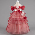 Red children's dress with floral details on a mannequin against a gray background, Obroi