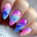 Nails with a gradient design of pink, blue, and purple on a neutral background, Obroi