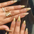 Full set of 24‑piece medium almond nails pink sheer base with metallic embossed heart cross line