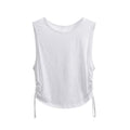 White sleeveless top with thin straps on a white background, featuring the brand 'Obroi'.