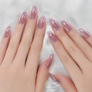 Close-up of hands with pink and purple gradient nail polish on a light background, Obroi