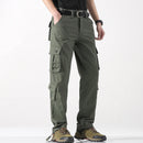Person wearing green cargo pants on a white background, Obroi