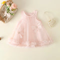 Pink baby dress with floral details on a light background, Obroi