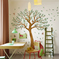 Children's room with a tree wall decal, desk, chair, and ladder, Obroi