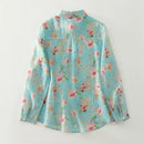 Floral patterned blouse on a white background, Obroi