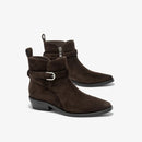 Brown suede ankle boots with buckles on a white background, branded 'Obroi'.