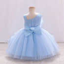 Light blue dress with a bow on a mannequin against a white background, Obroi