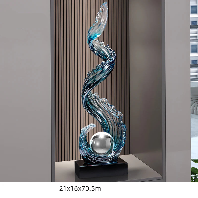 Obroi decorative glass sculpture with wavy design on a stand in a room setting.