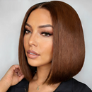 Woman with styled brown hair against a plain background, Obroi