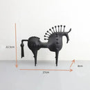 Black horse-shaped object with measurements on a white background, Obroi