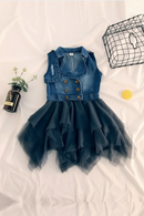 Children's denim dress with ruffled skirt on a white surface, Obroi